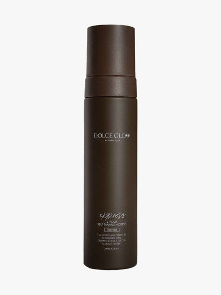 Dolce Glow Express Self-Tanning Mousse Special brown bottle on light gray background