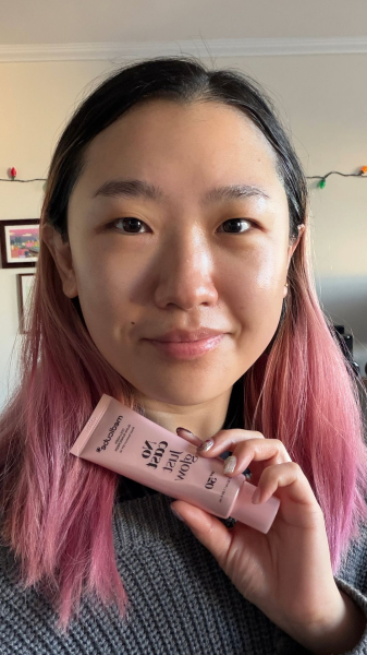 A selfie of Allure commerce editor Sarah Han after applying the Medicube No Cast Just Glow Collagen Sunscreen